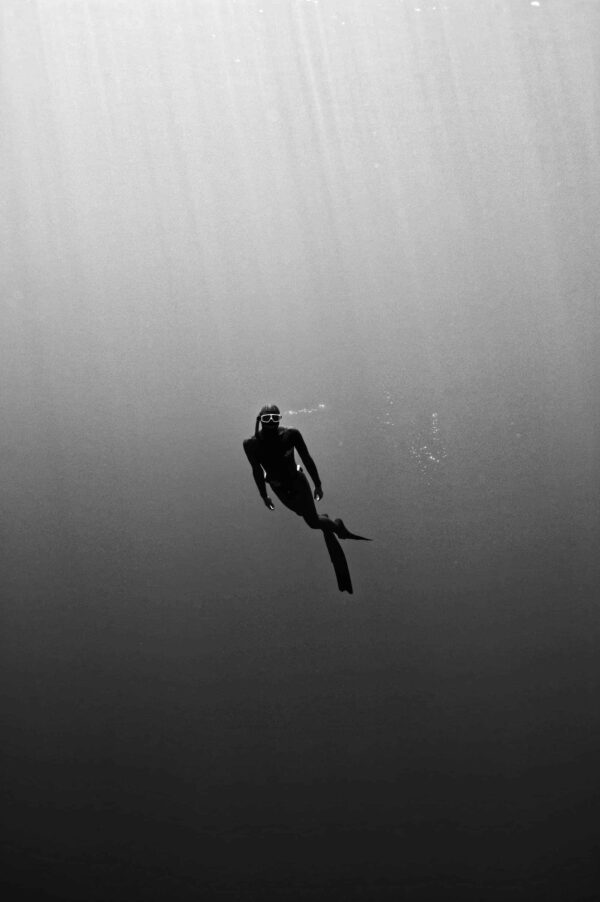 Black and white photo of freediver