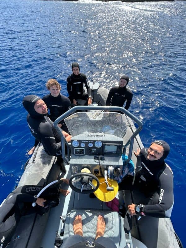 Arial shot of freedivers on a boat getting ready